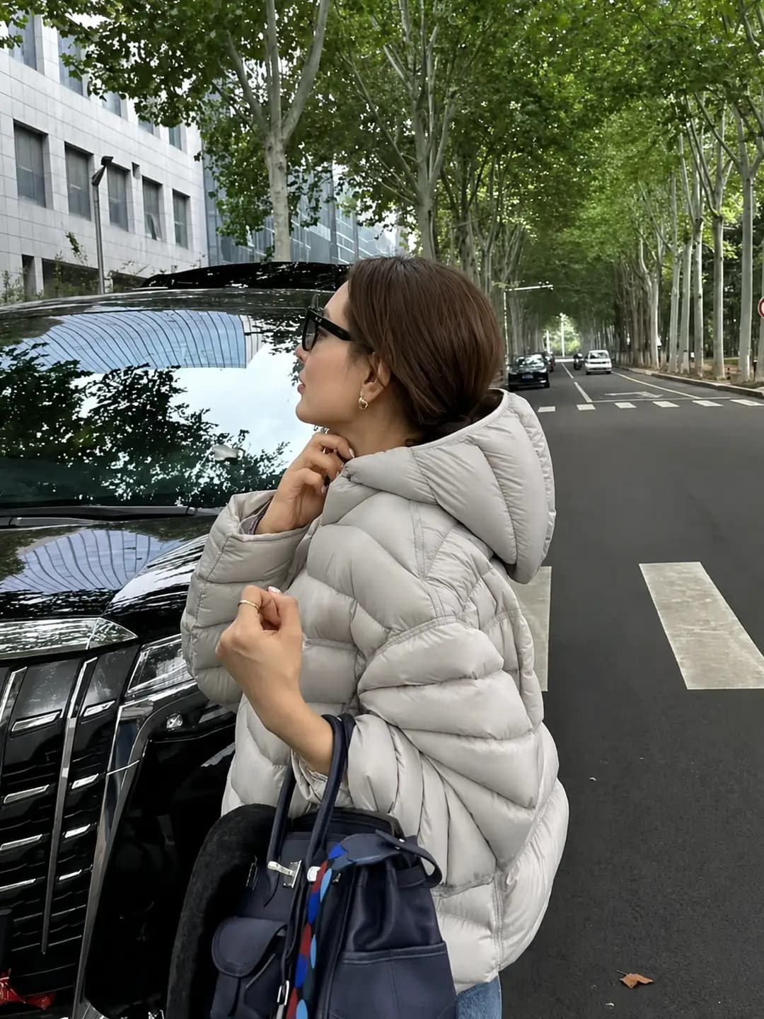 Lightweight short women's hooded warm jacket 90% white duck down 2026 korean casual