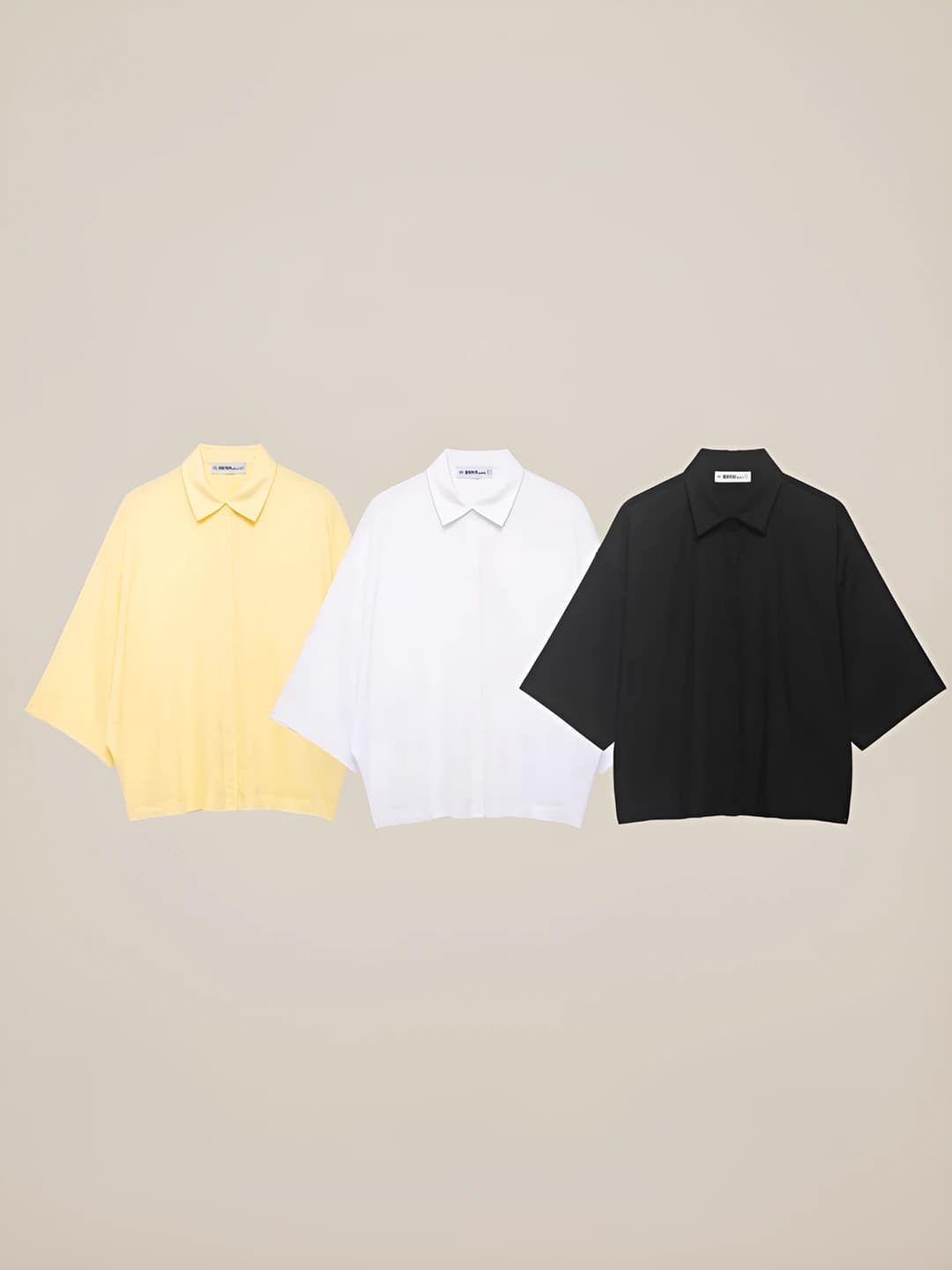 Ayollar uchun bahor-yoz ko'ylak-shirt: qaytarma yoqa, yarim yeng, bo'sh (oversize) kesim, bir rangli, kundalik uslub