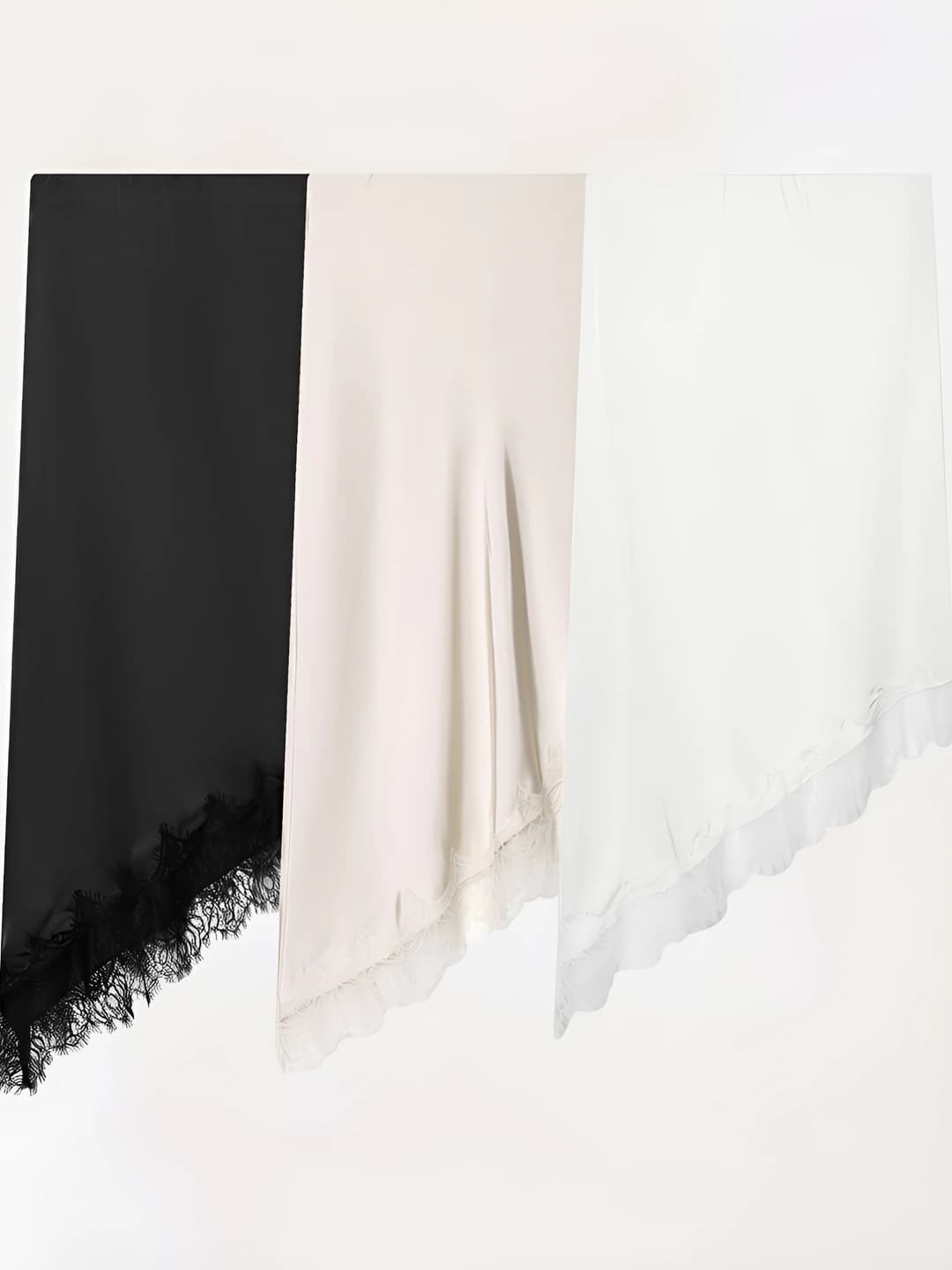 Women's straight cut skirt with lace trim, solid colour, mid-length, stretch, satin-like fabric