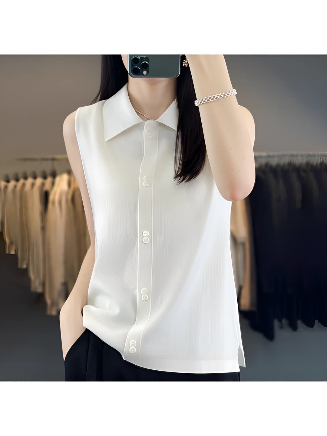 Ayollar uchun bahor-kuzgi yengsiz, qaytarma yoqali, bir rangli, bo'sh (oversize) kesimda ko'ylak-shirt yoqali mayka