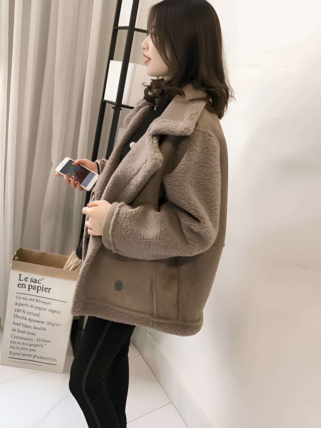 Women's winter loose fit jacket with lapel collar made of imitation shearling