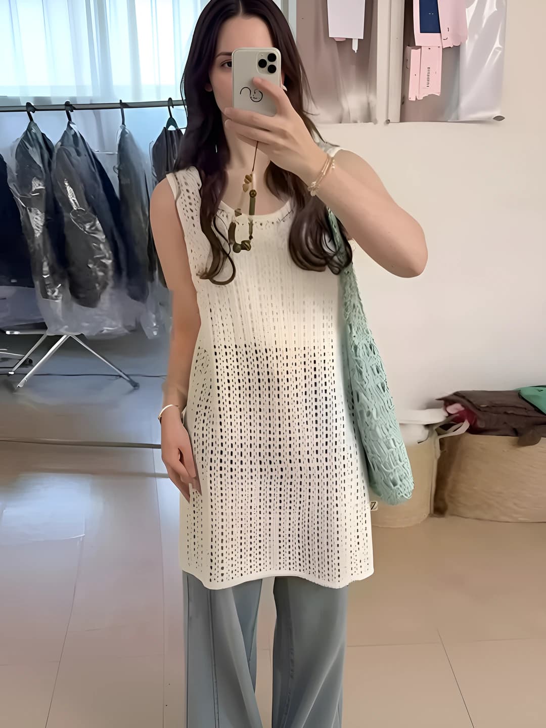 Women's summer thin loose fit crew neck sleeveless mid-length knitted top in tank top style