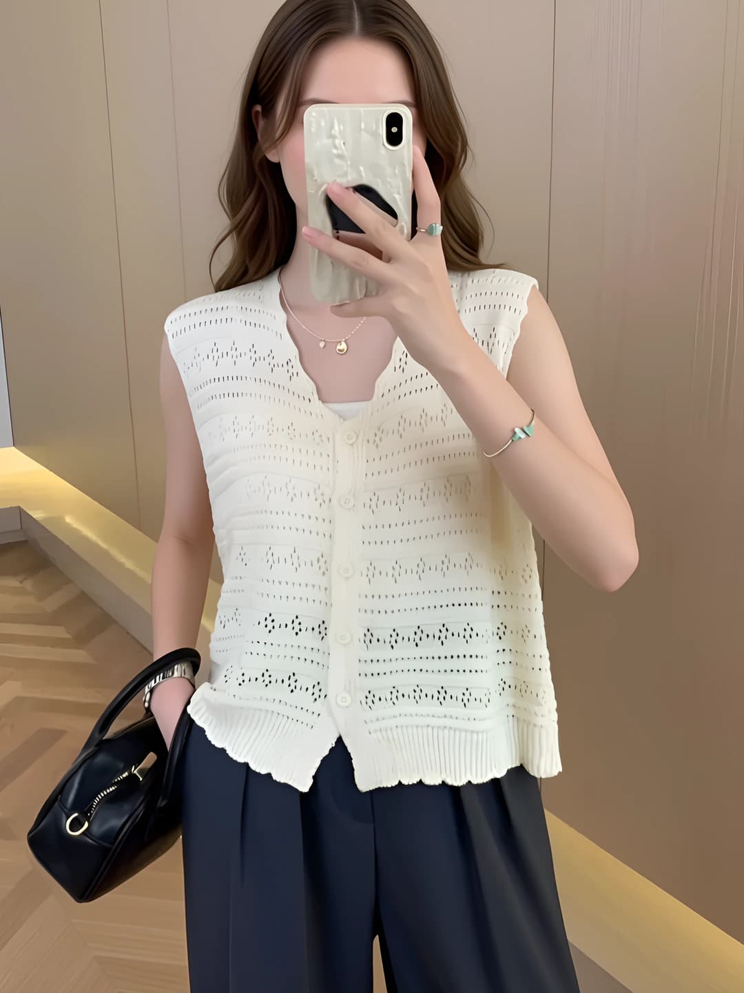 Ayollar uchun yozgi retro yengsiz dumaloq yoqali bo'sh (oversize) bir rangli sviter
