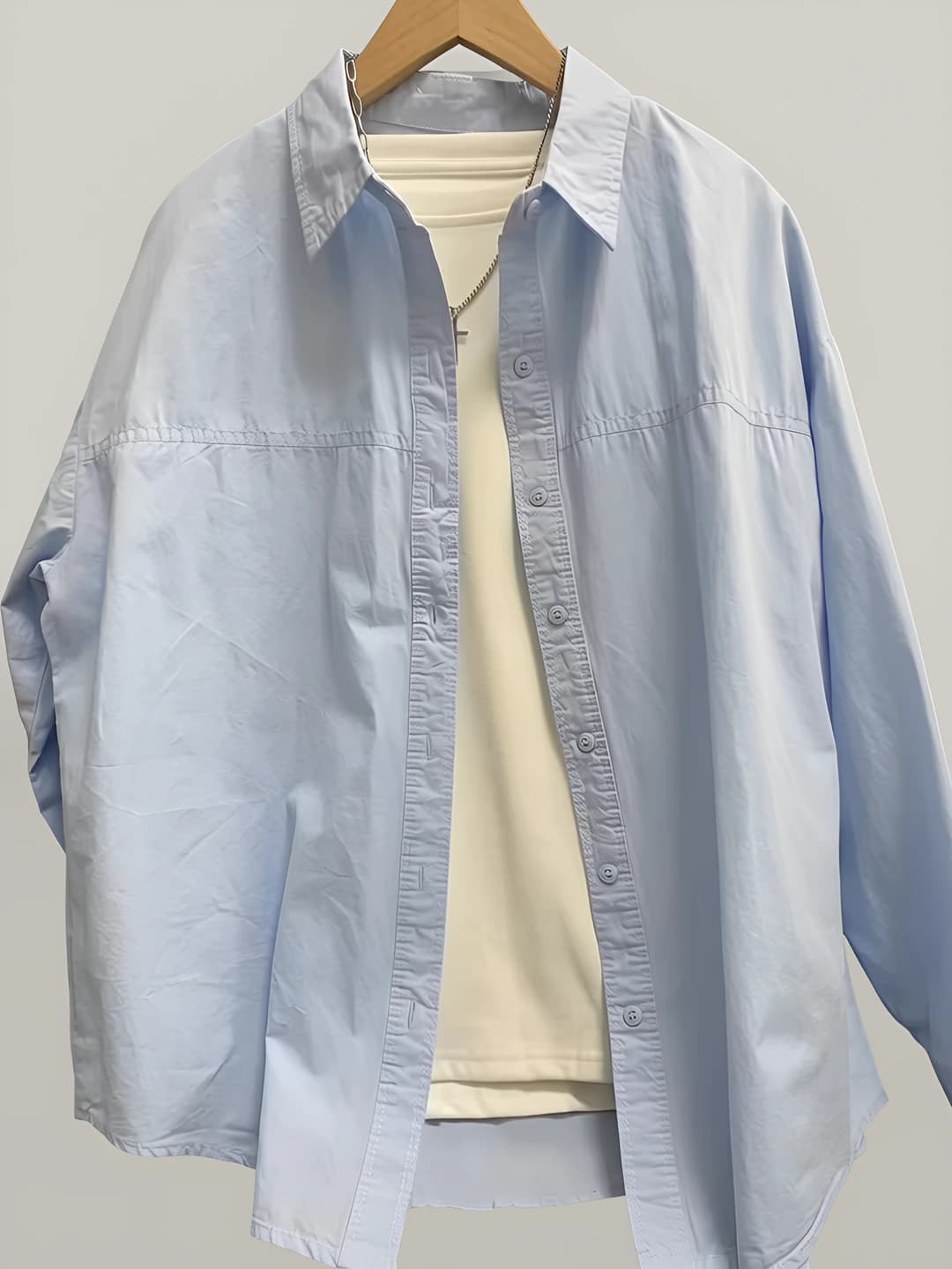 Women's long-sleeve button-up shirt with lapel collar, loose fit, solid colour
