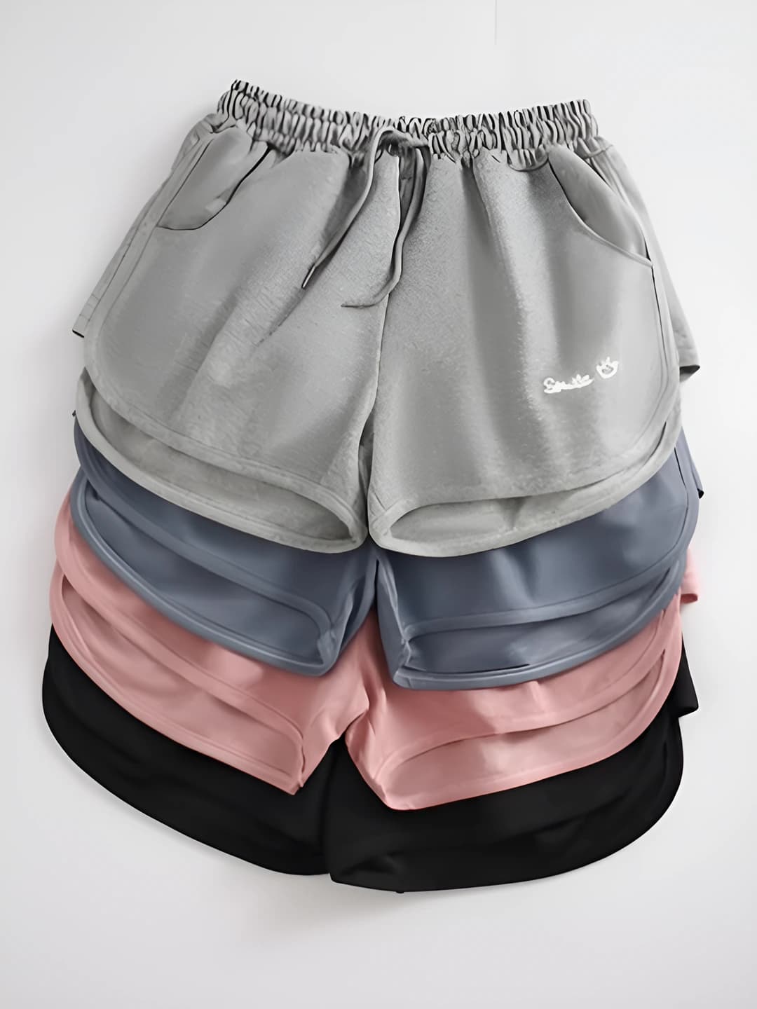 Ayollar uchun yozgi koreys uslubida elastik belli bo'sh (oversize) nozik ko'rsatadigan A-shakl keng oyoqli sport shorti, kashtali, kundalik