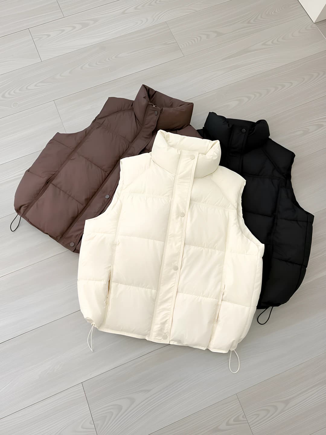 Women's Korean style loose fit padded vest with stand collar and zip, solid colour, autumn-winter 2026