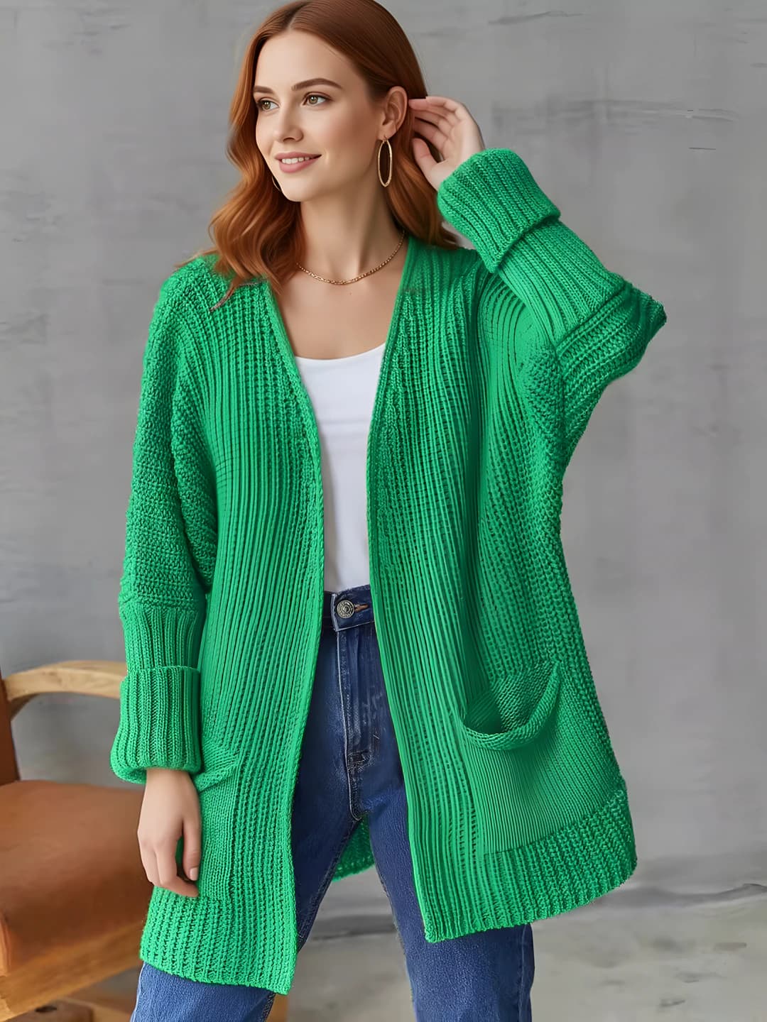 Ayollar uchun trikotaj kardigan, katta o'lcham, bo'sh (oversize) kesim, V-yoqa, uzun yeng, o'rta-uzun, bir rangli, kundalik uslub
