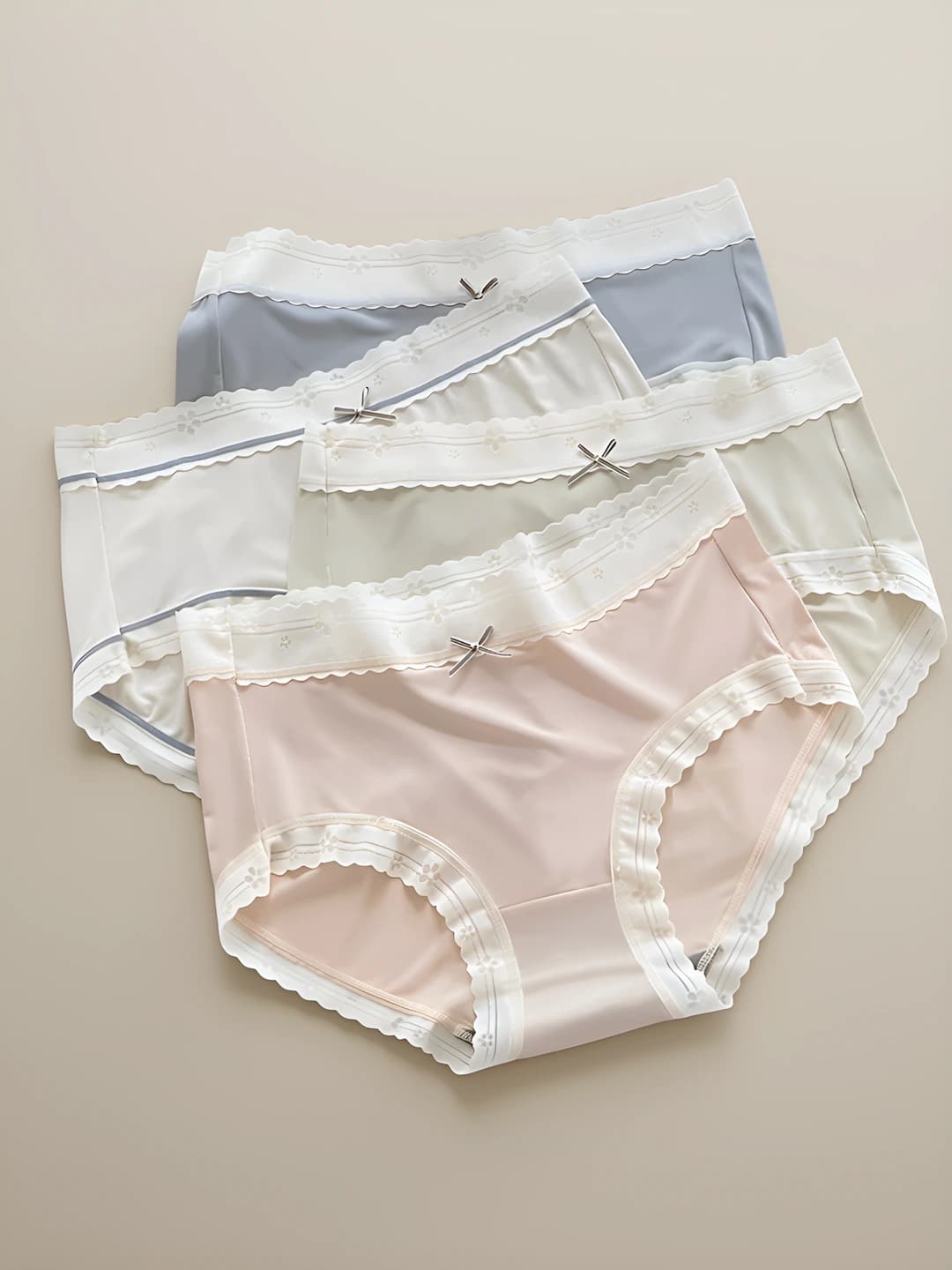 Women's ice-silk fabric briefs, high stretch, seamless, breathable, mid-waist, color-blocked, bow pattern, summer and all-season
