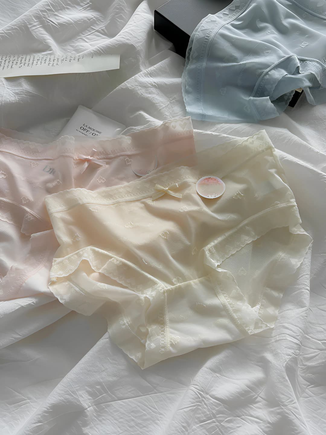 Women's summer thin ice-silk briefs, seamless, quick-dry, breathable, solid colour, pure cotton gusset, mid-waist, bow pattern