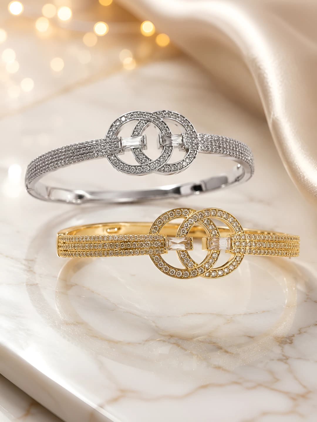 Women's bracelet with two interlocking rings and zircon