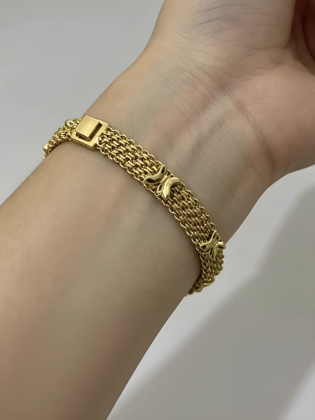 Women's retro metal chain bracelet with copper cutout butterfly design