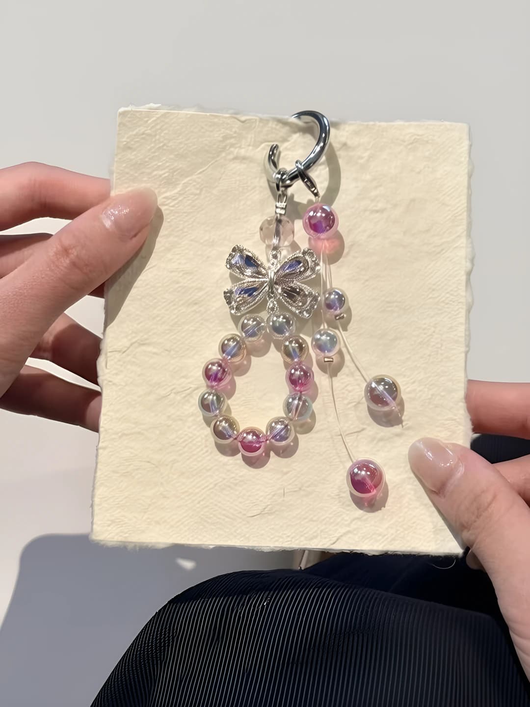 Pink laser charm