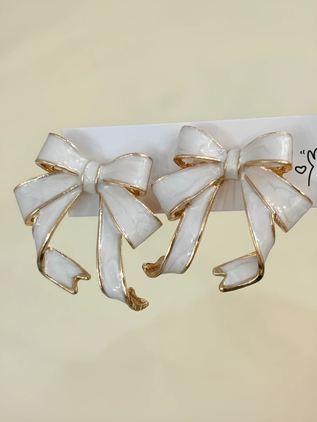 Champagne gold bow earrings