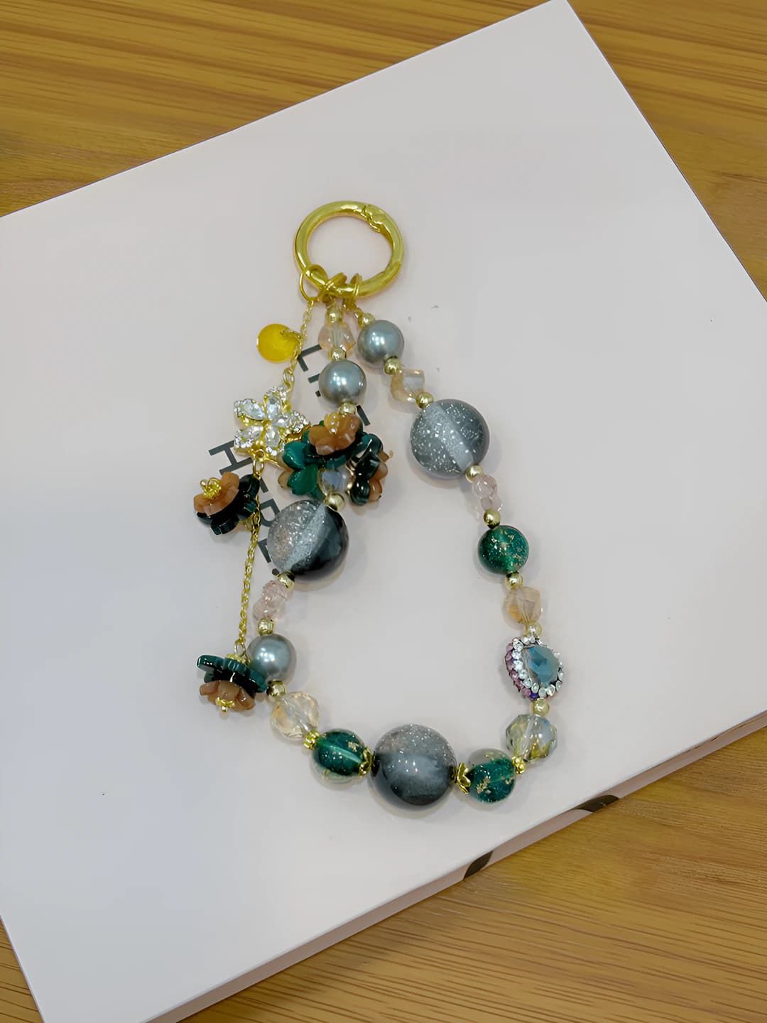 Floral tassel charm