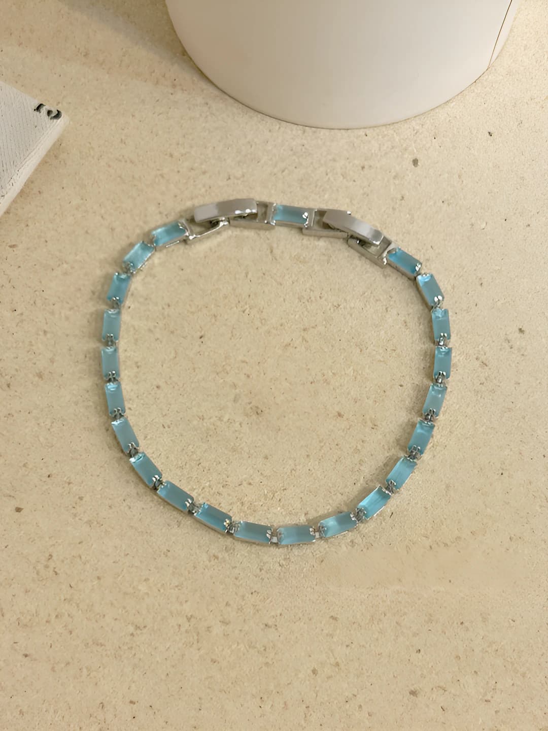 Silver base light blue square bracelet