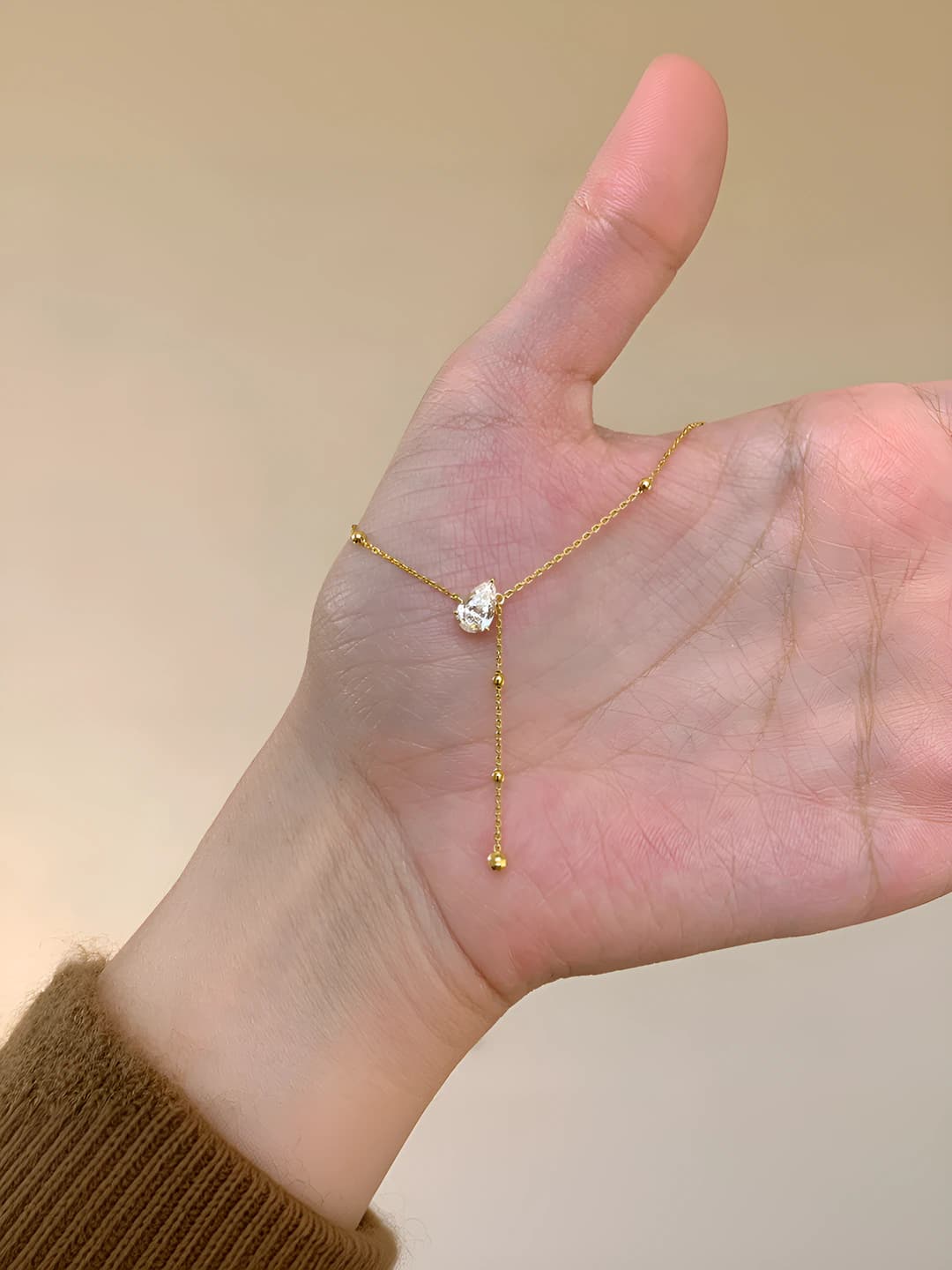 Women's Y-shaped necklace with gold beads and zircon in French style 2026