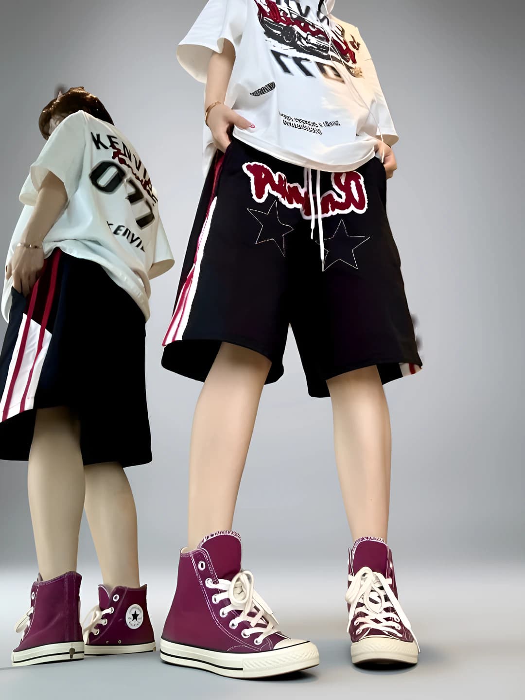 Ayollar uchun yozgi sport uslubidagi bo'sh (oversize) baland bel tizzagacha shorti