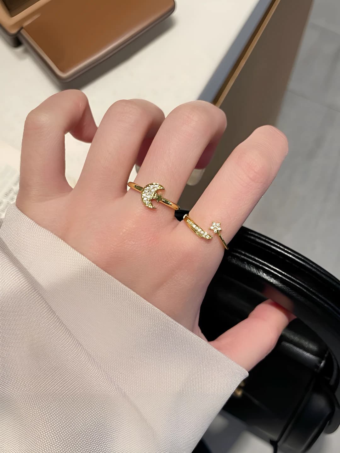 Women's adjustable open ring in gold color with star and moon design in light luxury style