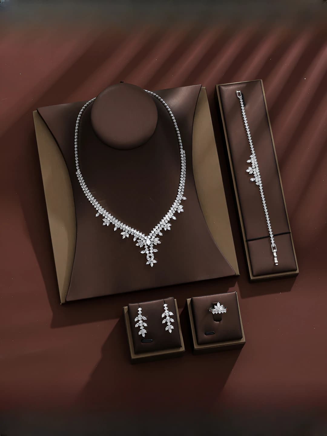 Women's zircon set: pendant, earrings, bracelet and ring with snowflake pattern