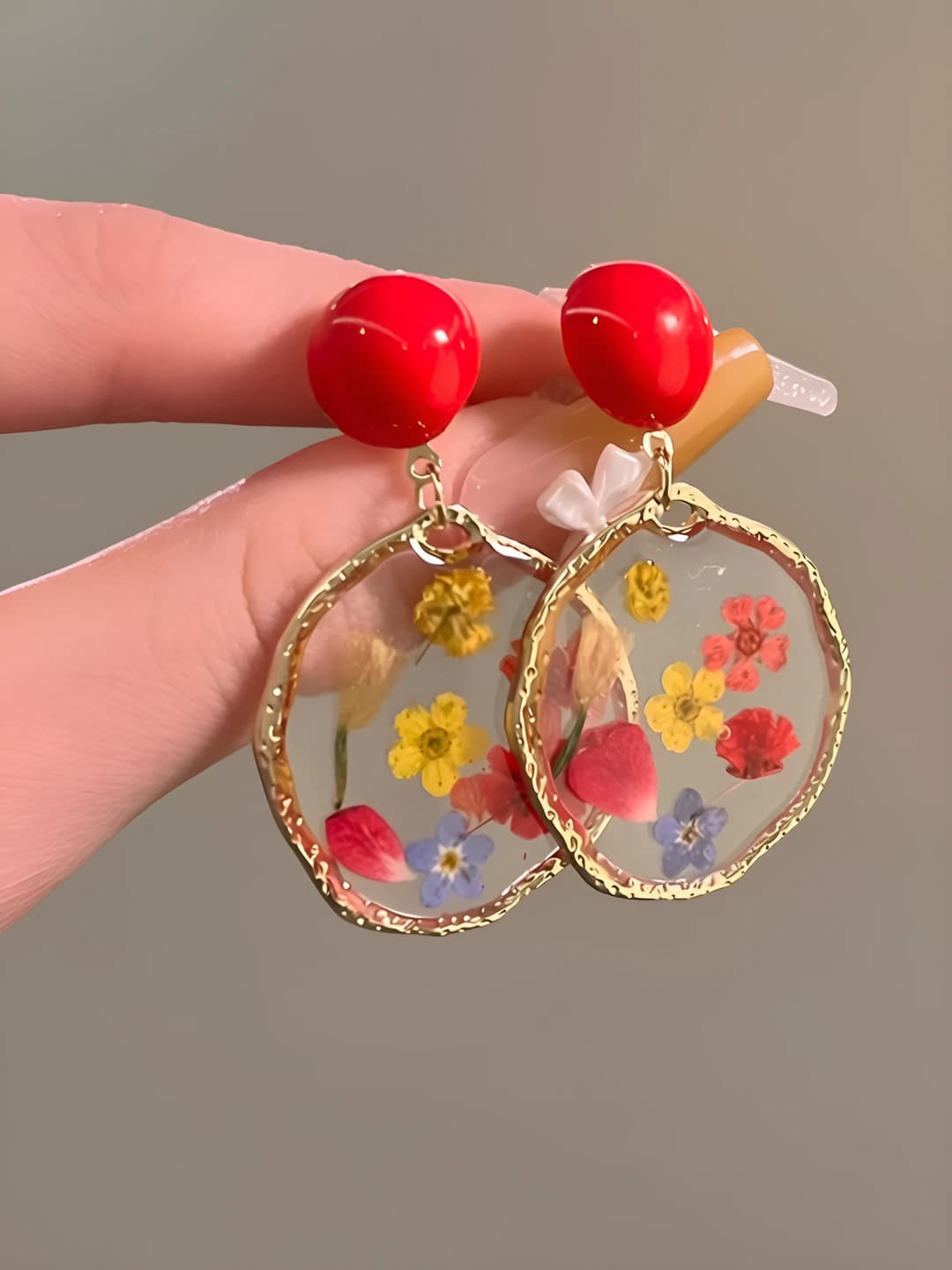 Women's retro round earrings with floral pattern made of metal
