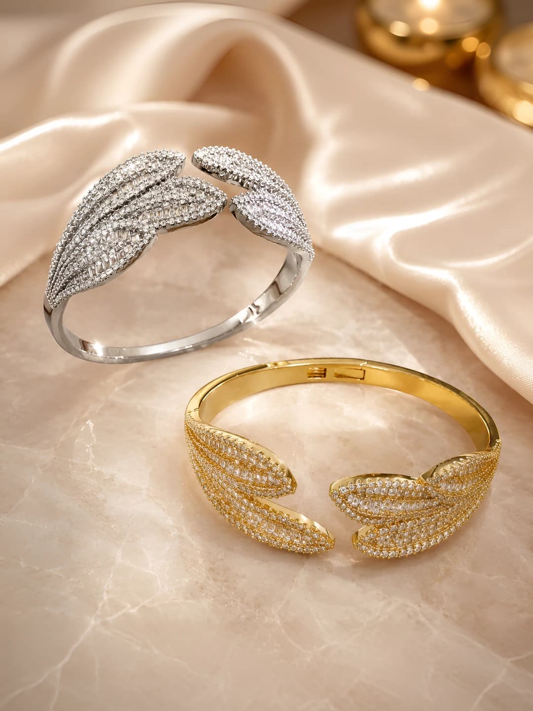 Women's lightweight luxury style bracelet with shiny wing and leaf design
