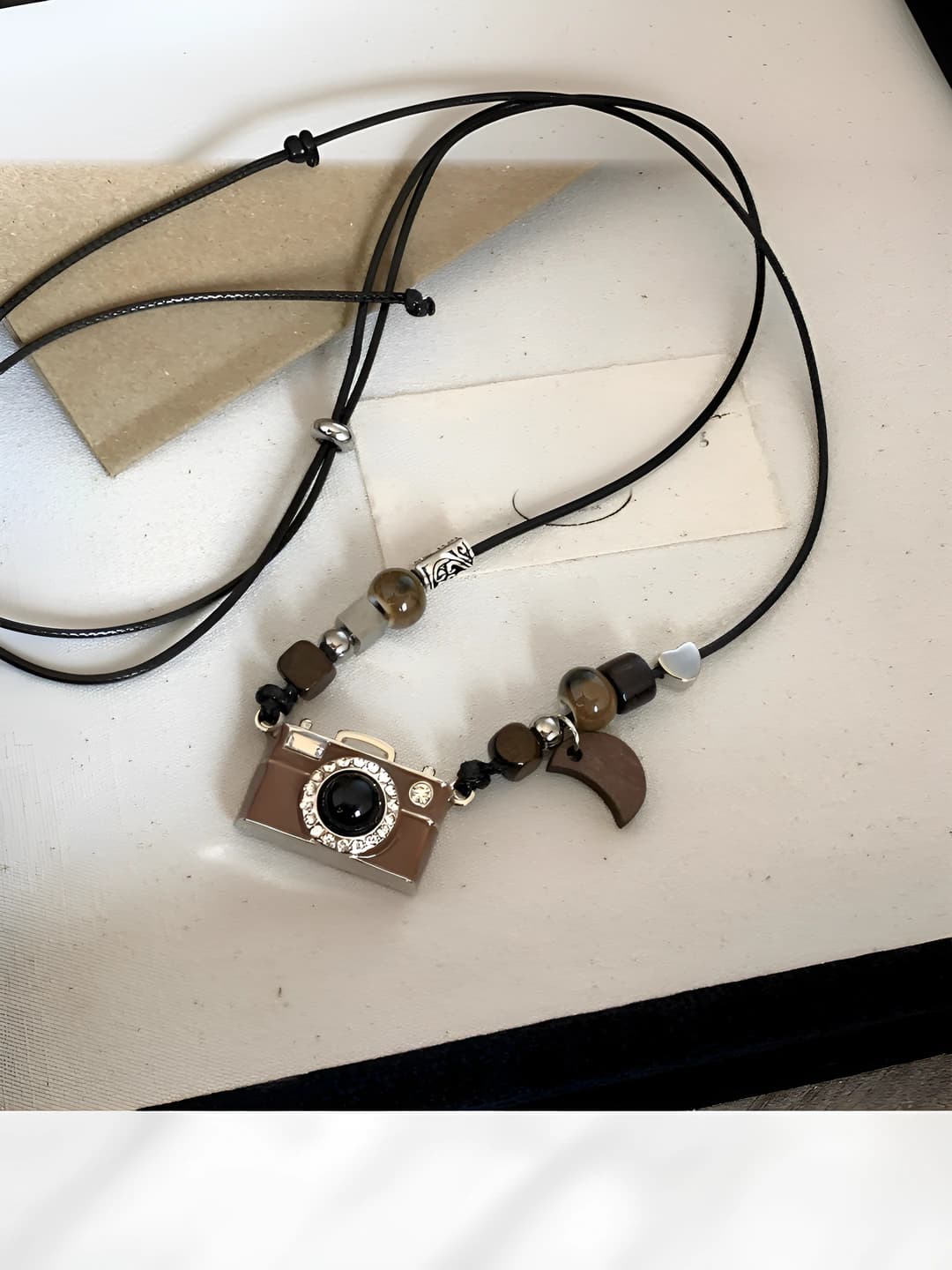 Leather cord camera