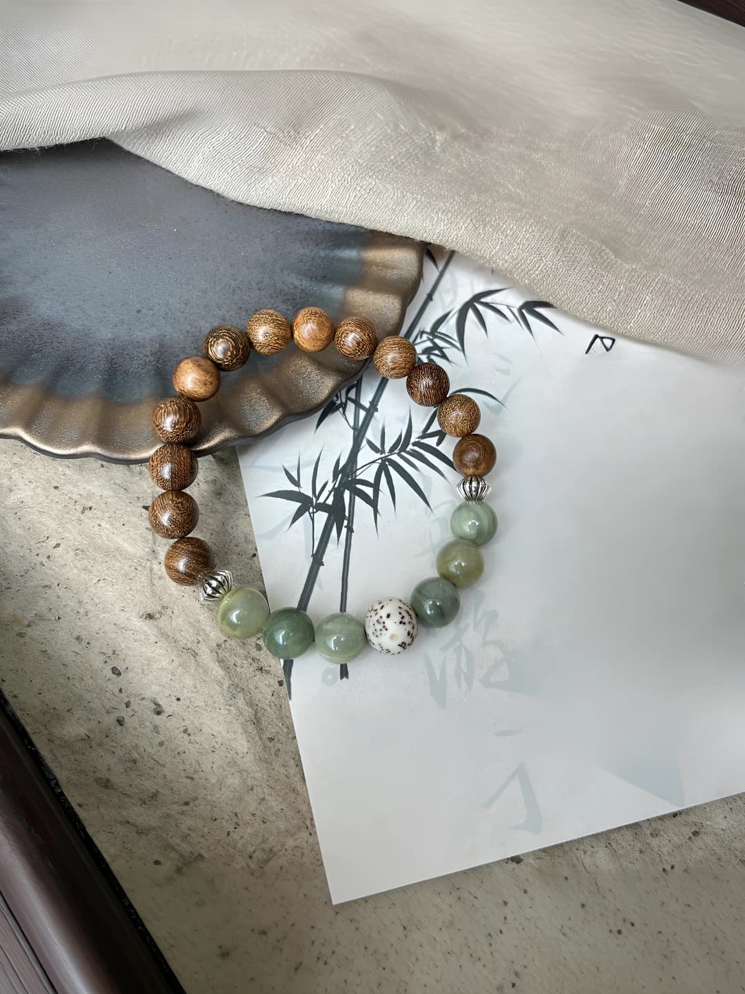 Sandalwood bracelet with gold threads