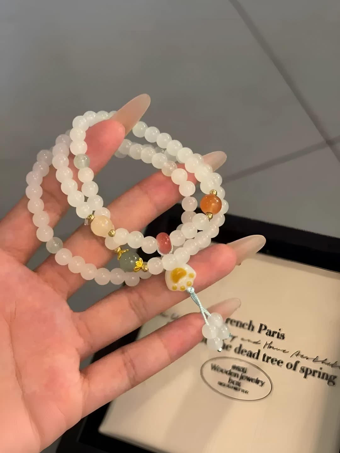 White triple layer cat paw bracelet