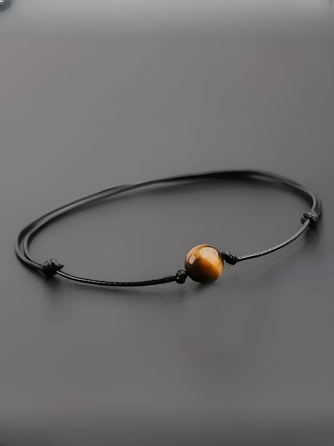 Women's bracelet: handmade, star-shaped, in natural tones, original design, with patterned design element