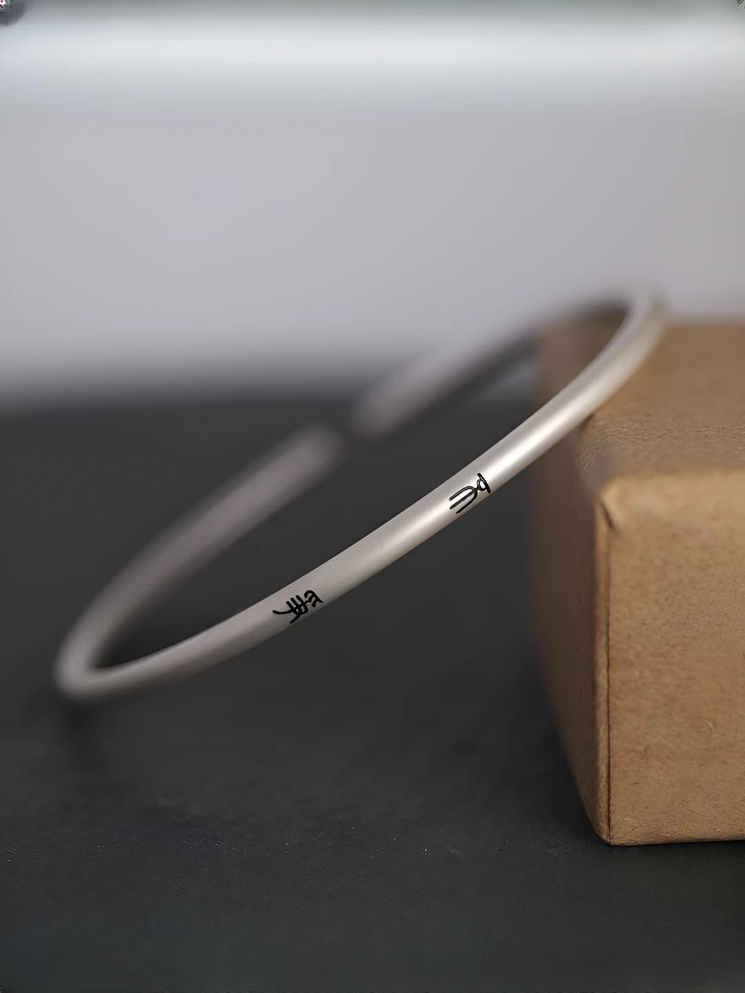 Non-contention, matte silver