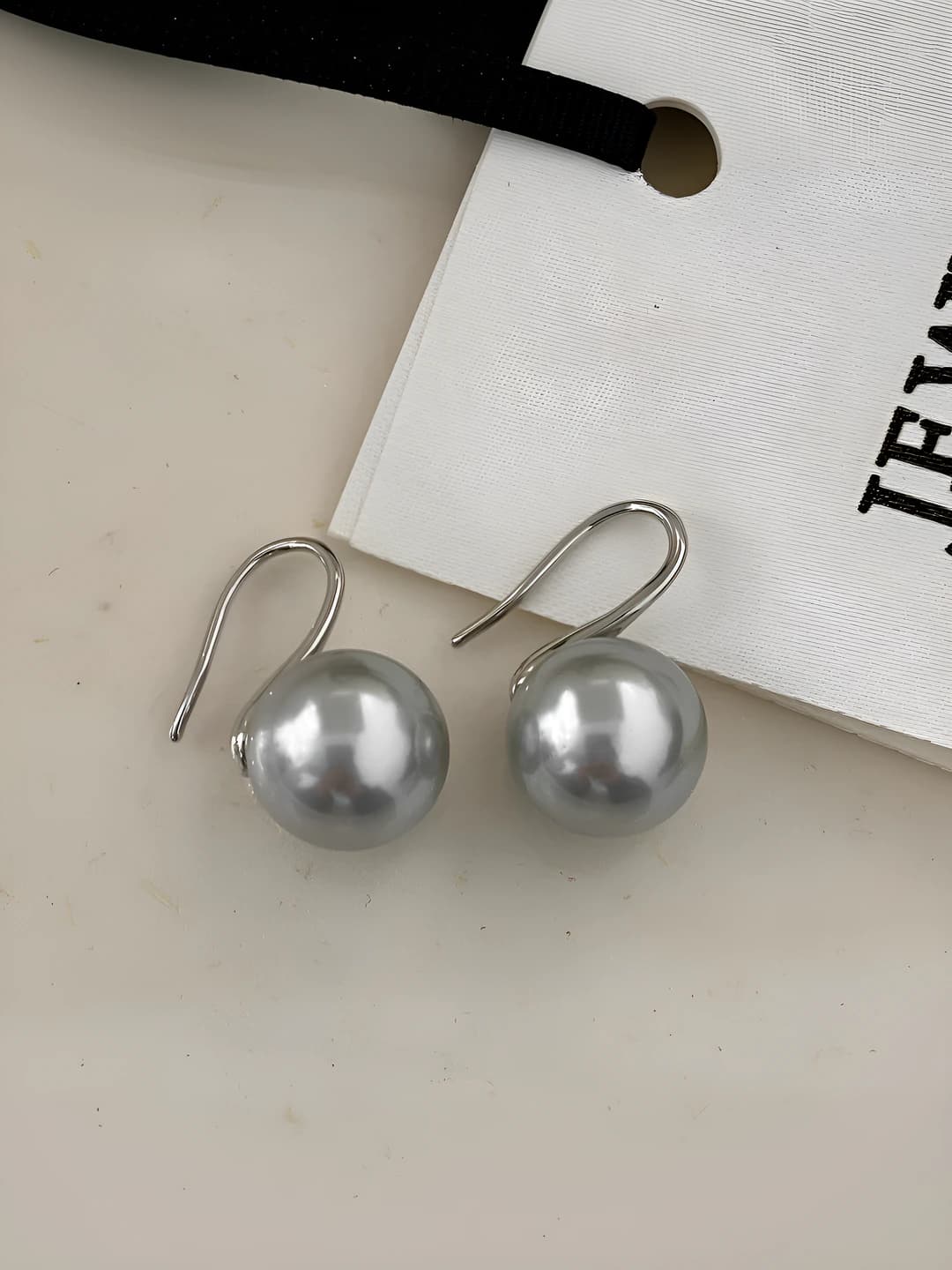 Silver earrings with 12mm grey glass pearls