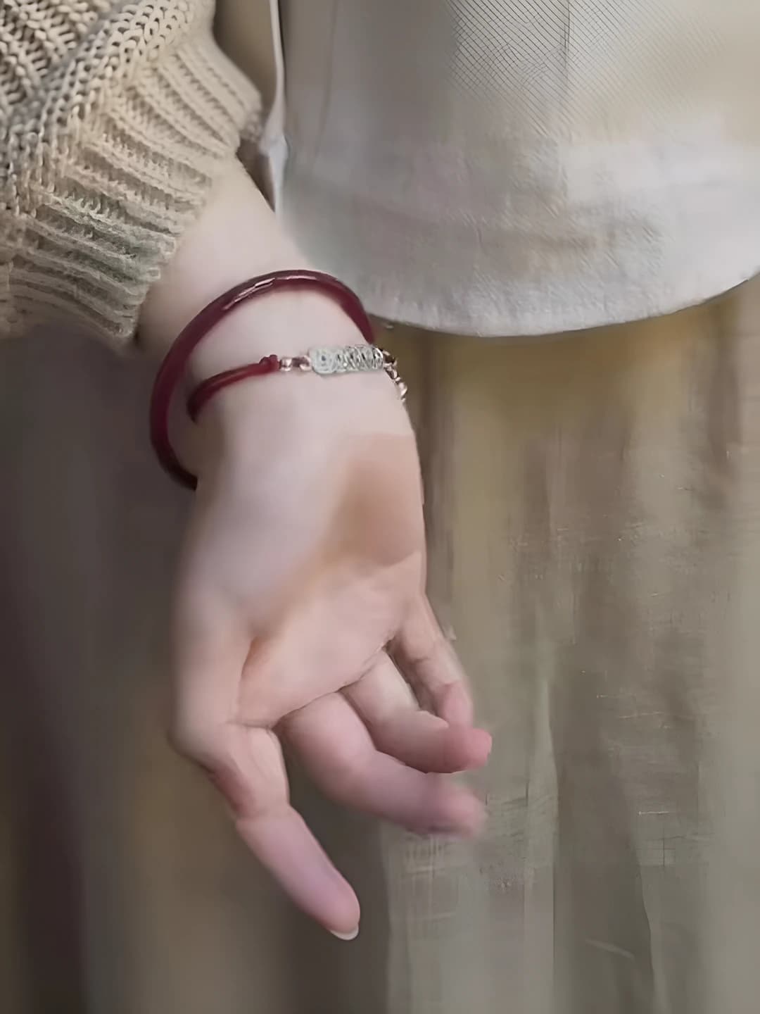 M621, red braided bracelet