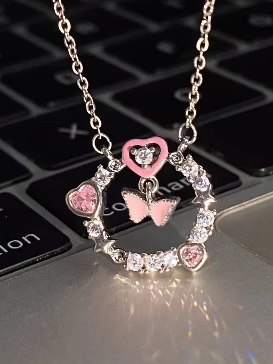Pink butterfly necklace