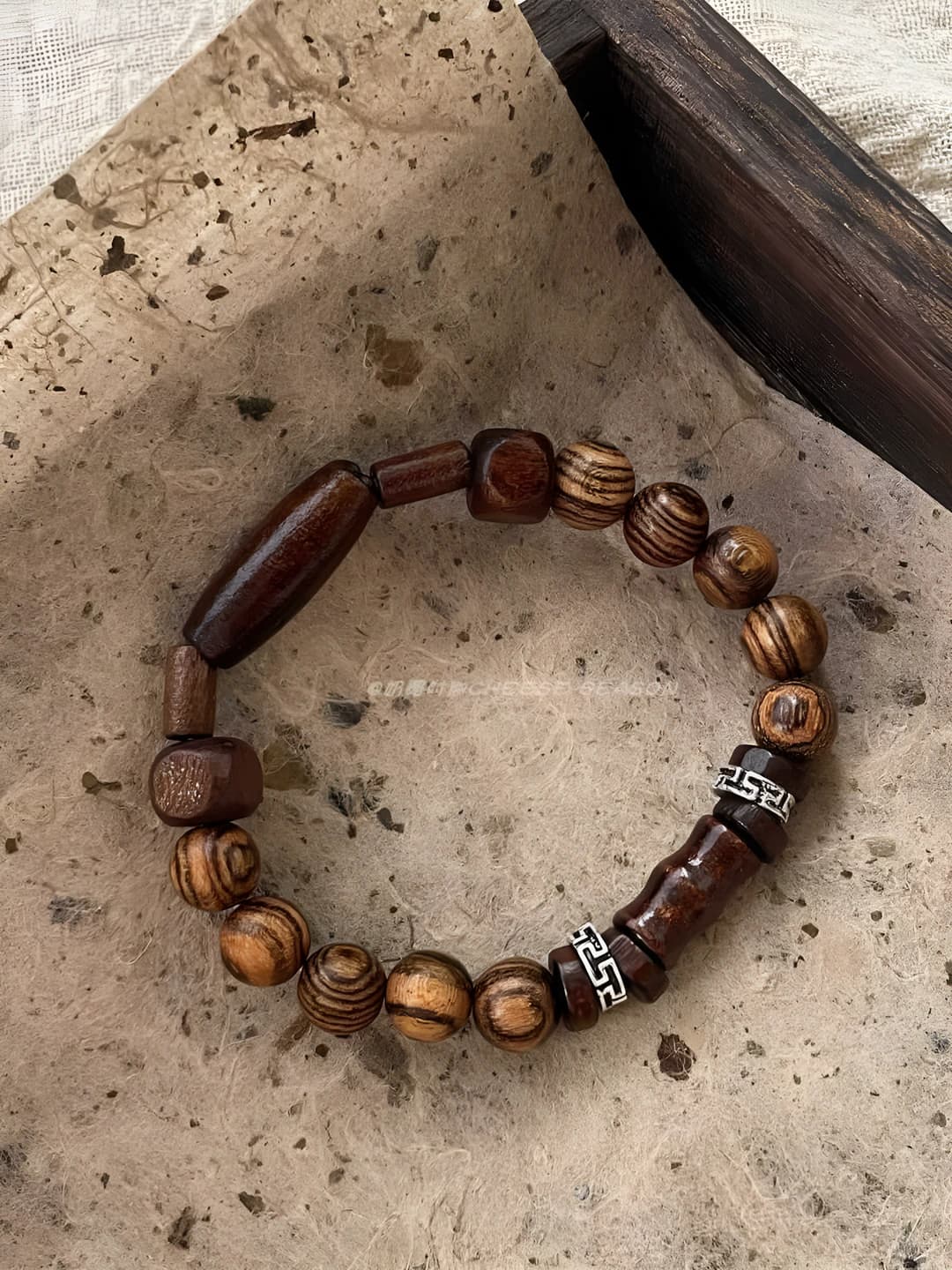 Retro handmade wooden bracelet with geometric design