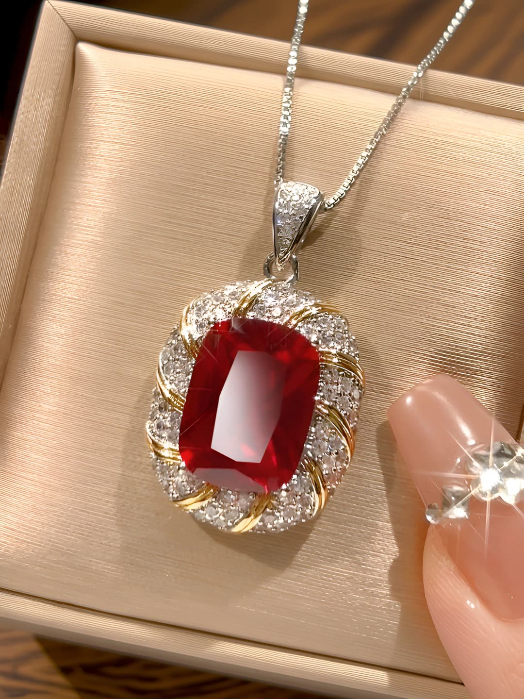 Red ruby pendant with chain