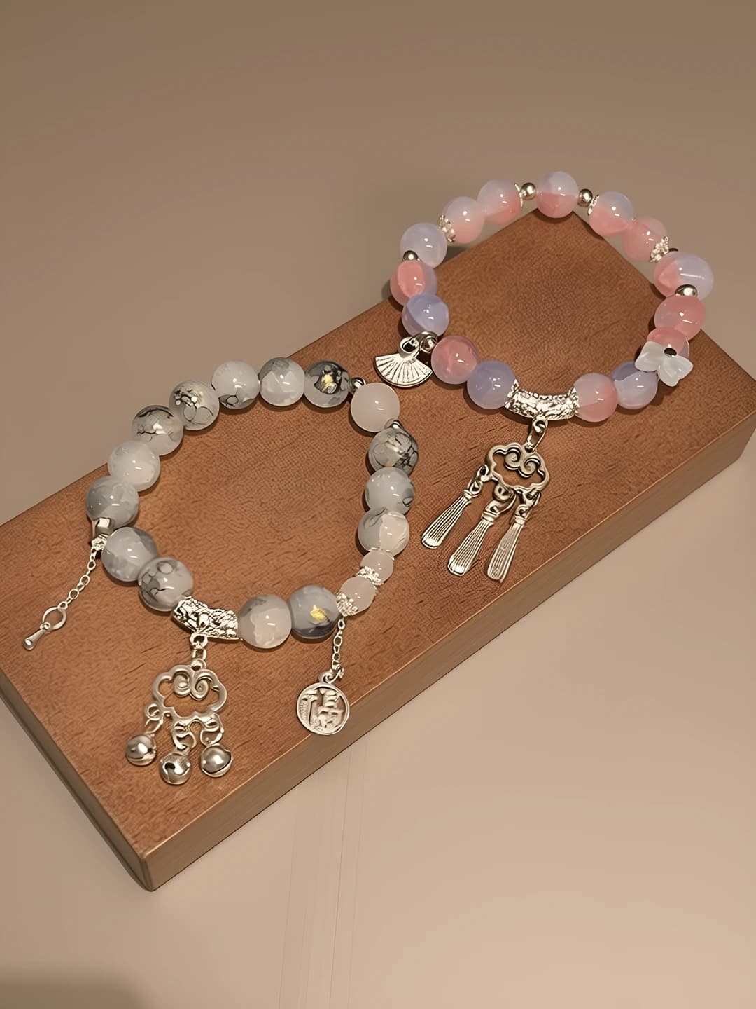 Women's handmade glass and faience bracelet with 'Ruyi' lock pendant