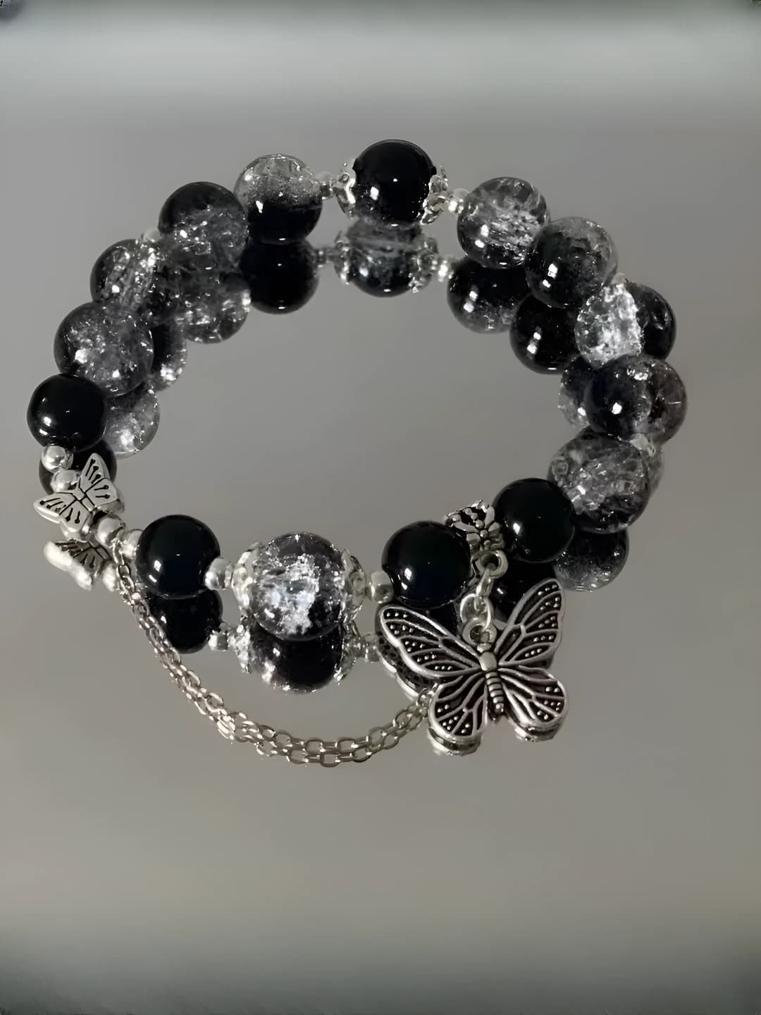 M746, black pearl butterfly