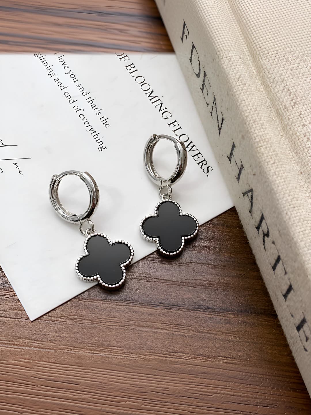 Silver with black flowers