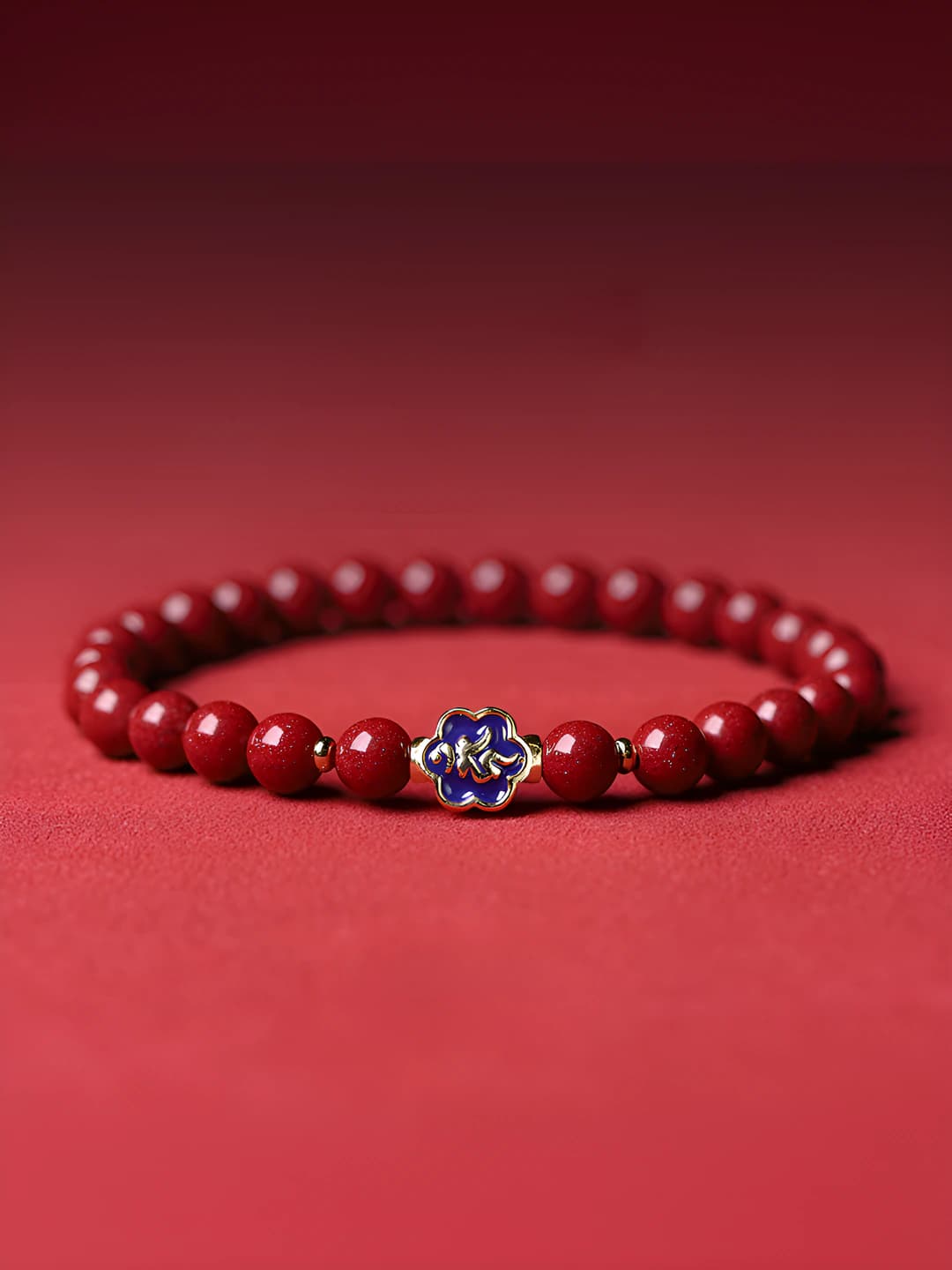 Red sand personal Buddha [Aksobhya Bodhisattva]