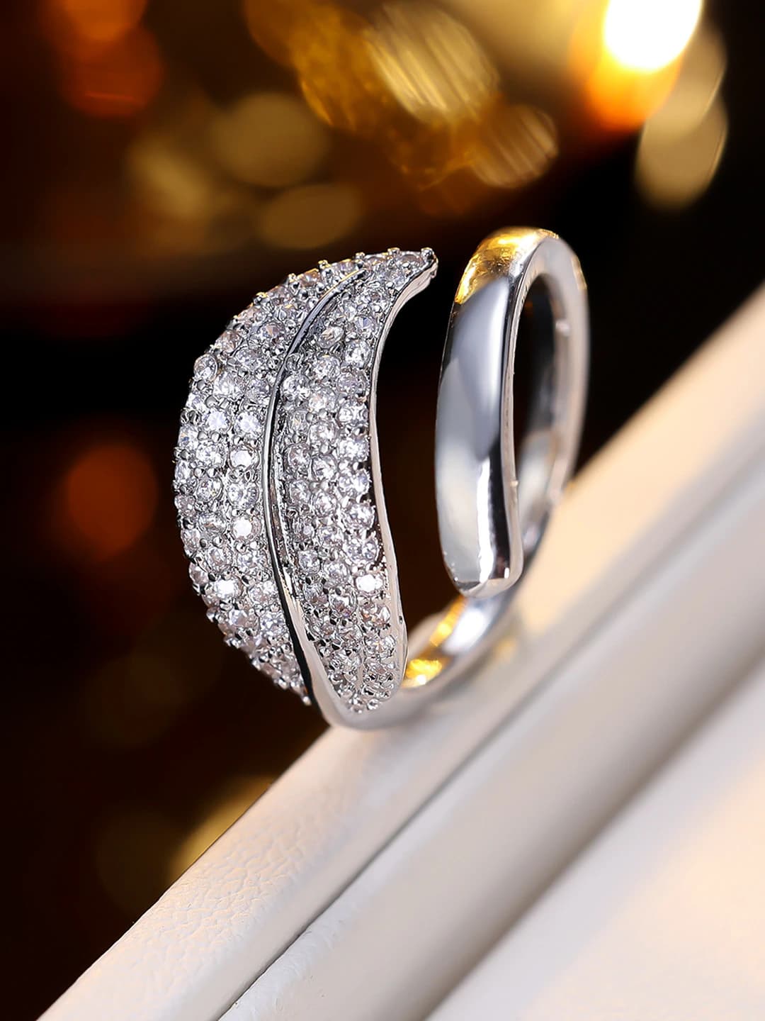 Women's adjustable open ring in gold-plated brass and zircon with feather and leaf design