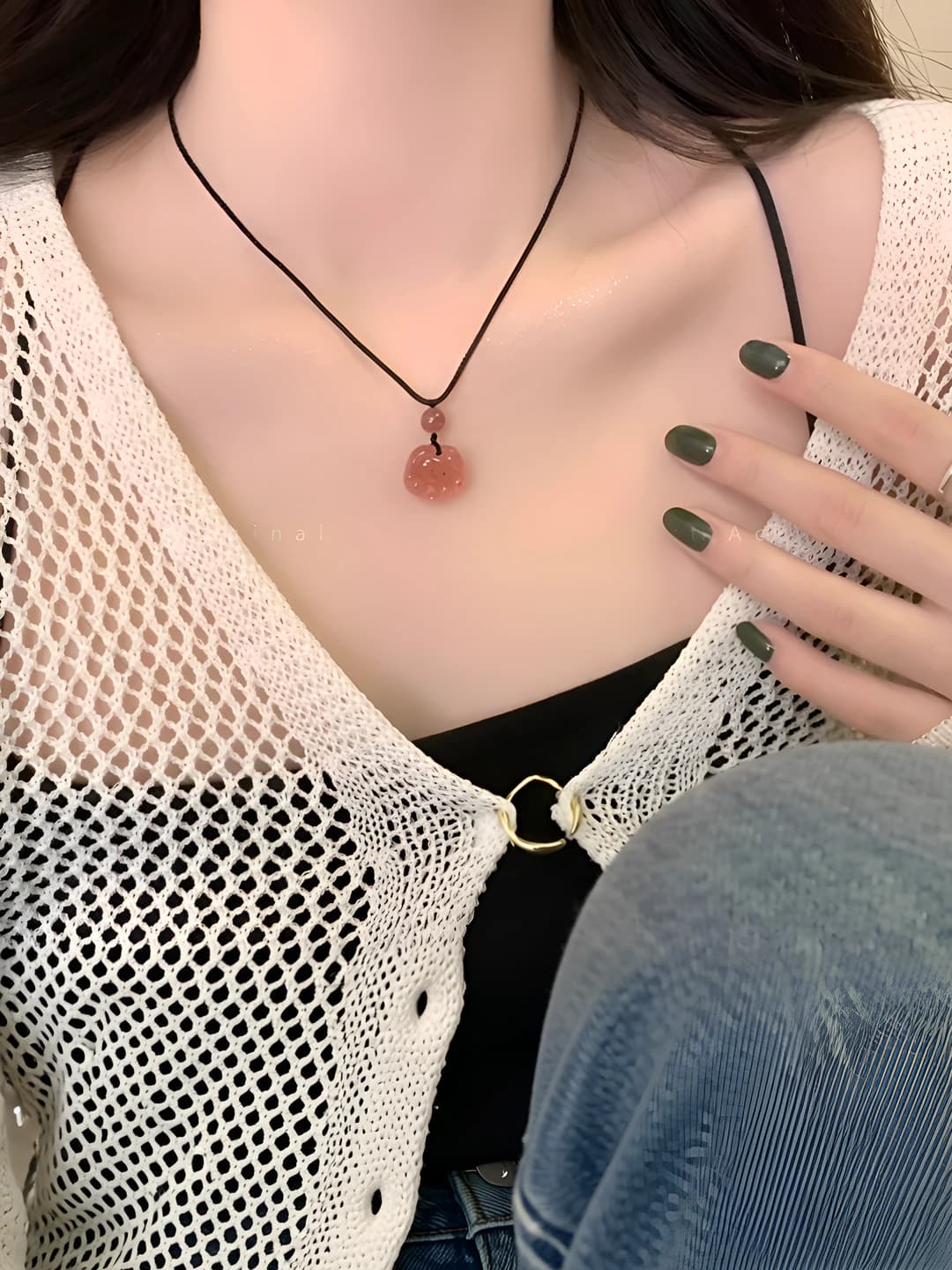 Women's short chain necklace with pink quartz cat paw pendant on braided cord in Korean style