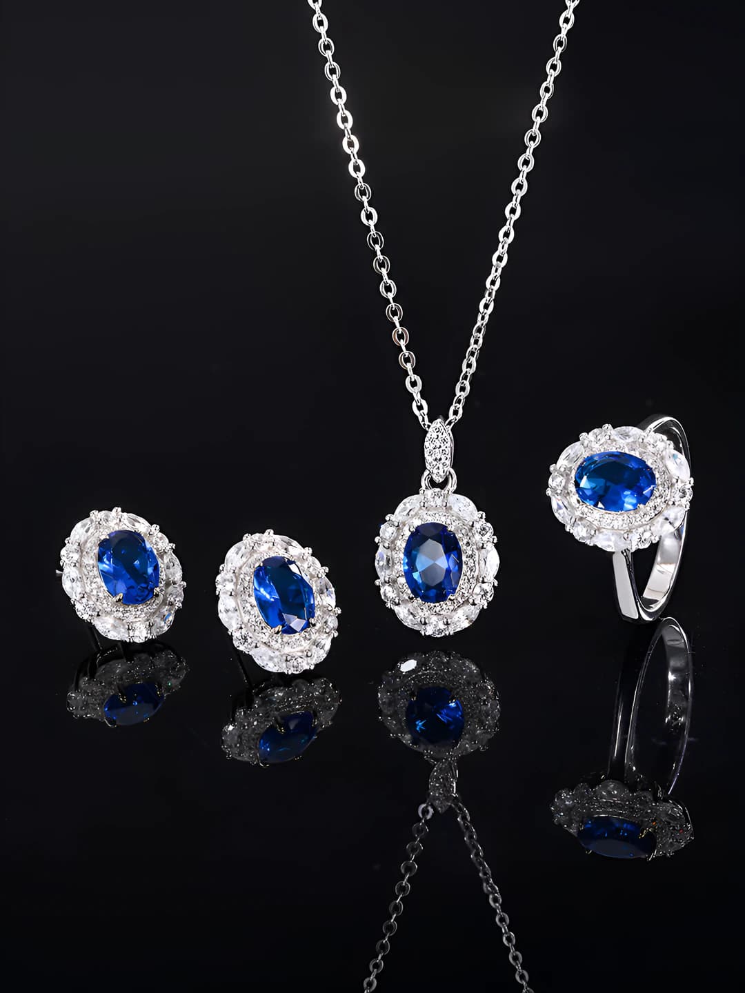 Women's 2026 retro gold-plated brass set with simulated blue spinel drop design (6*8)