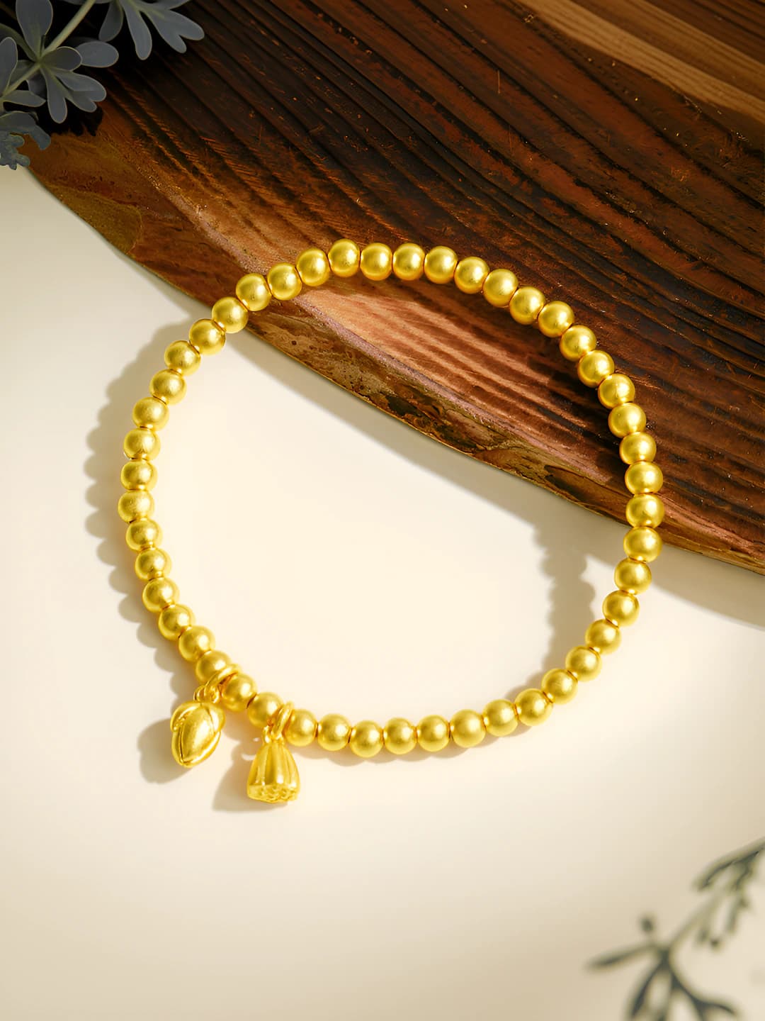 Women's stretch bracelet with lotus and lotus heart design