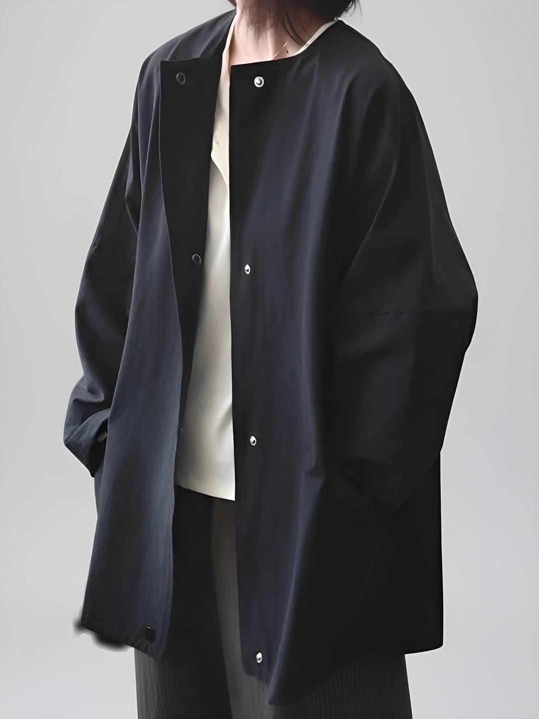 Women's Japanese style trench coat: crew neck, loose fit, long sleeve, solid colour black, mid-length