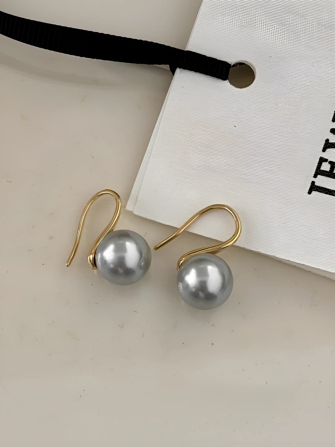 Gold earrings with 10mm grey glass pearls