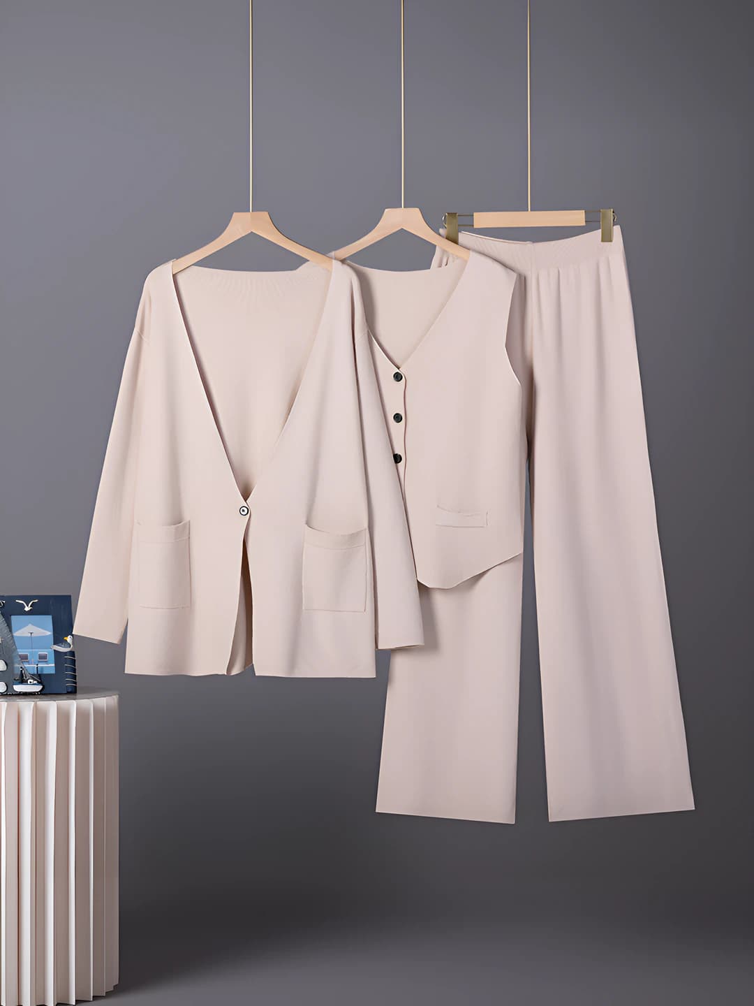 Women's autumn-winter knitted suit: sweater, vest and wide-leg trousers