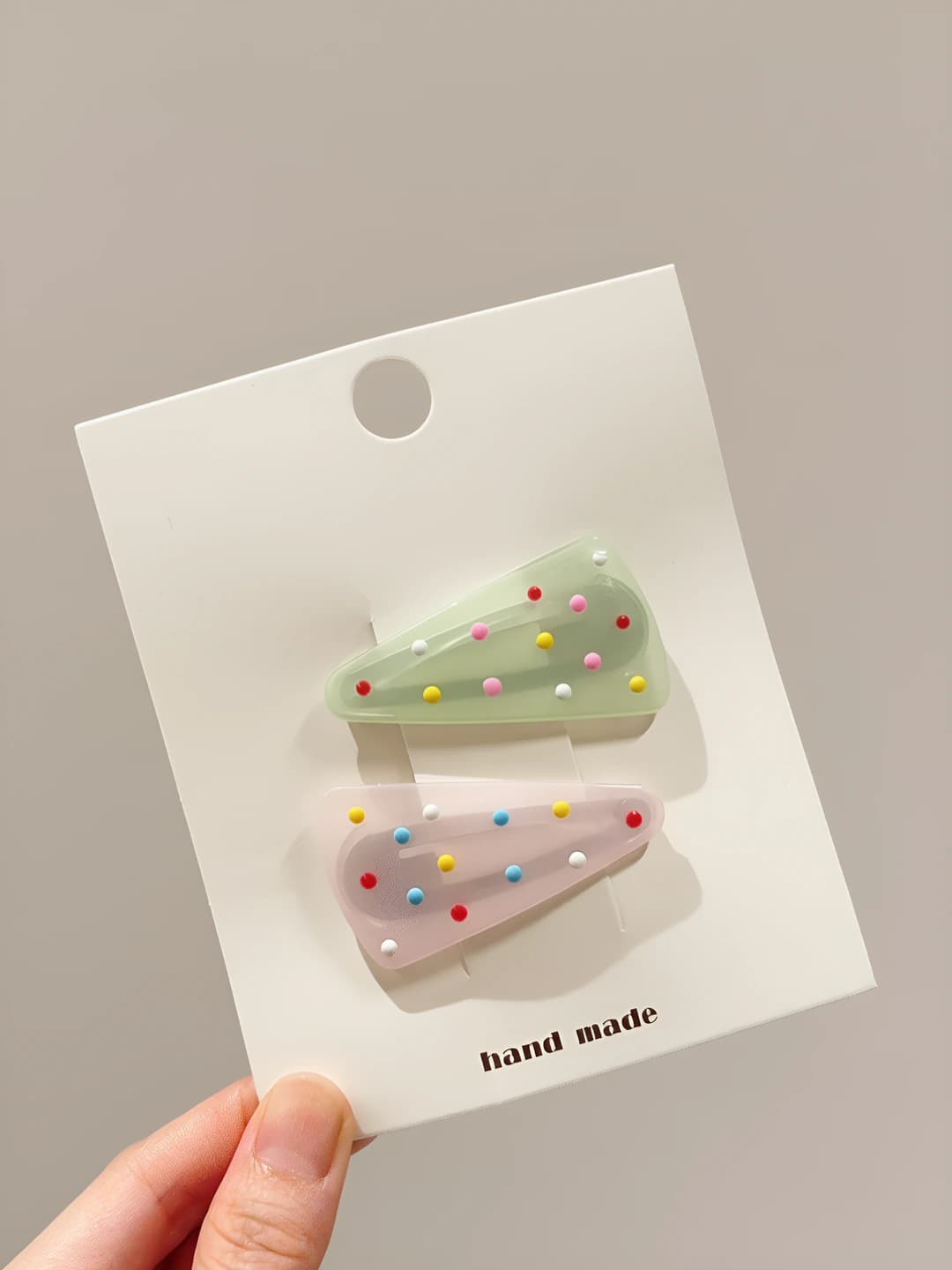 2# Light pink-green dotted triangle clip