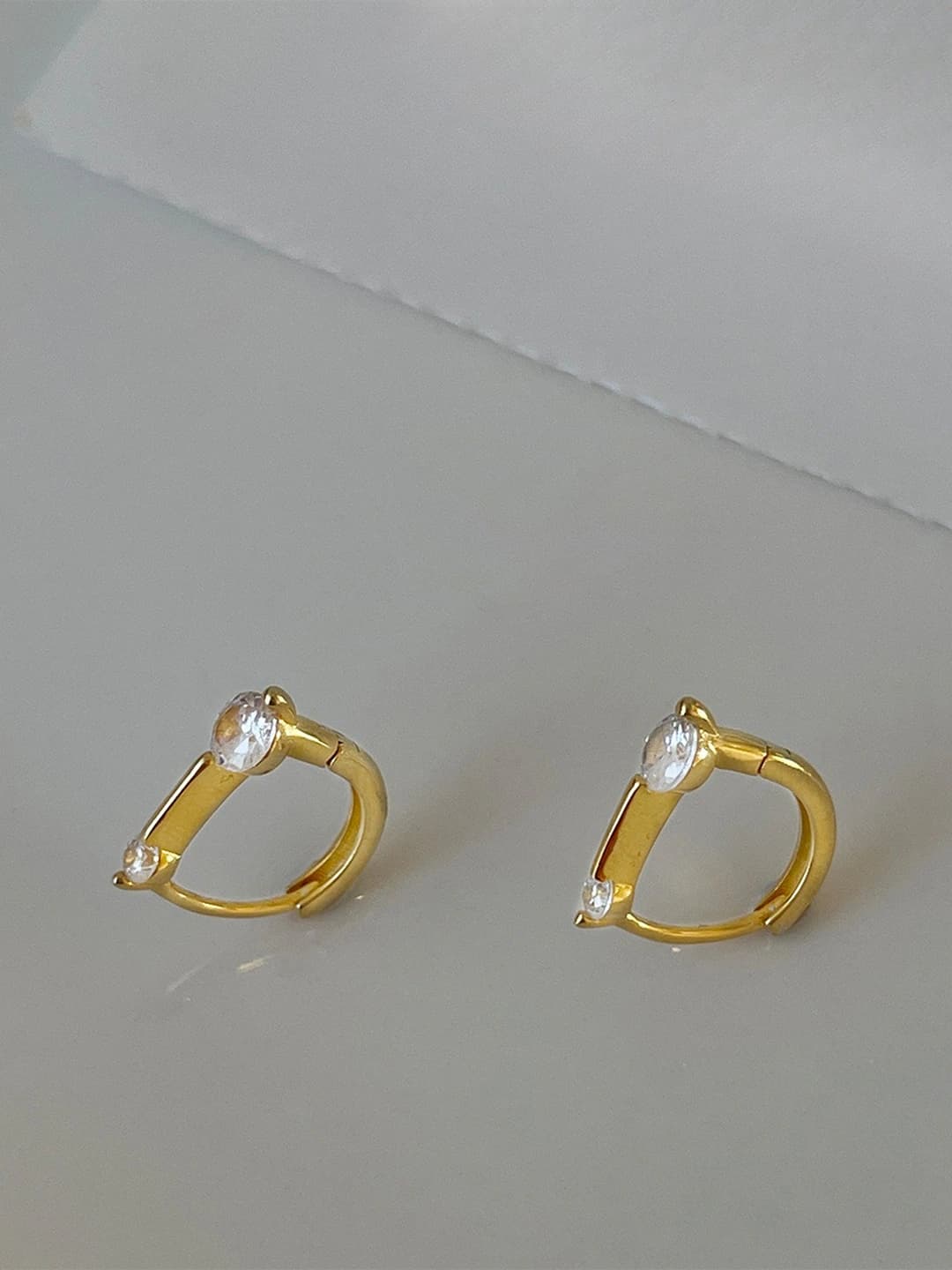 Gold linear zircon earrings