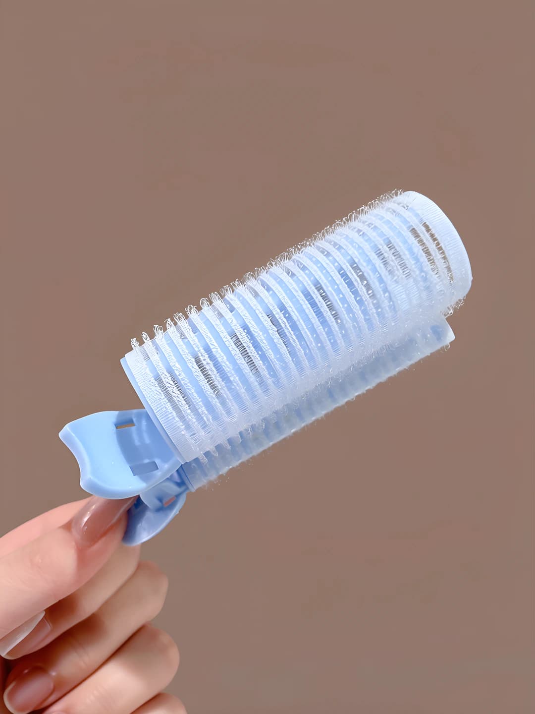 Blue curler, ~10.5 cm