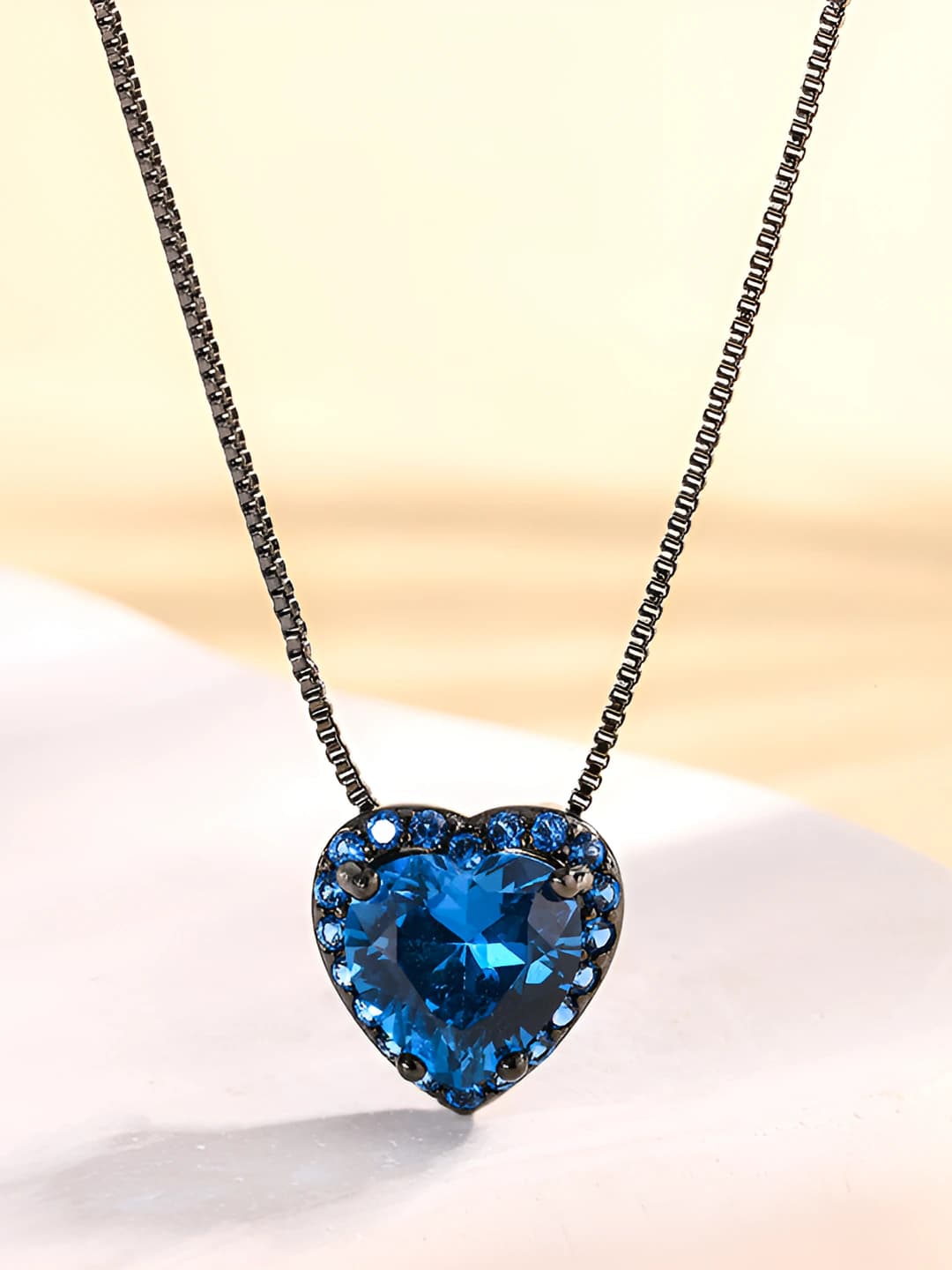 Black-gold blue spinel pendant with chain